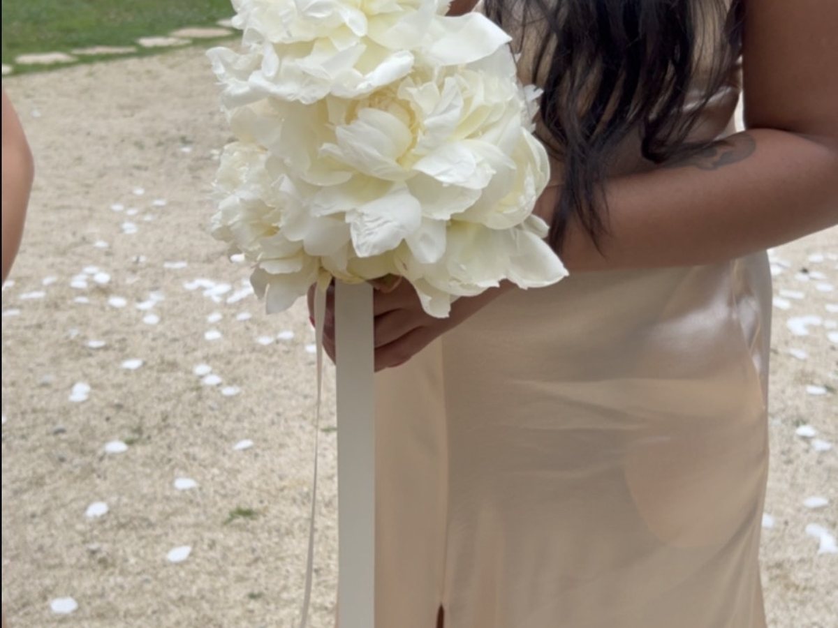 White peony bouquet, held